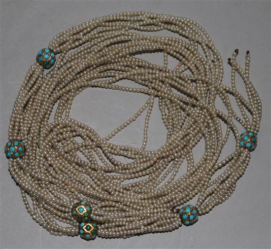 A multi strand seed pearl, yellow metal and turquoise set necklace, 116cm.